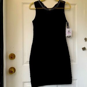 Woman’s Calvin Klein size 6 petite black dress new with tags